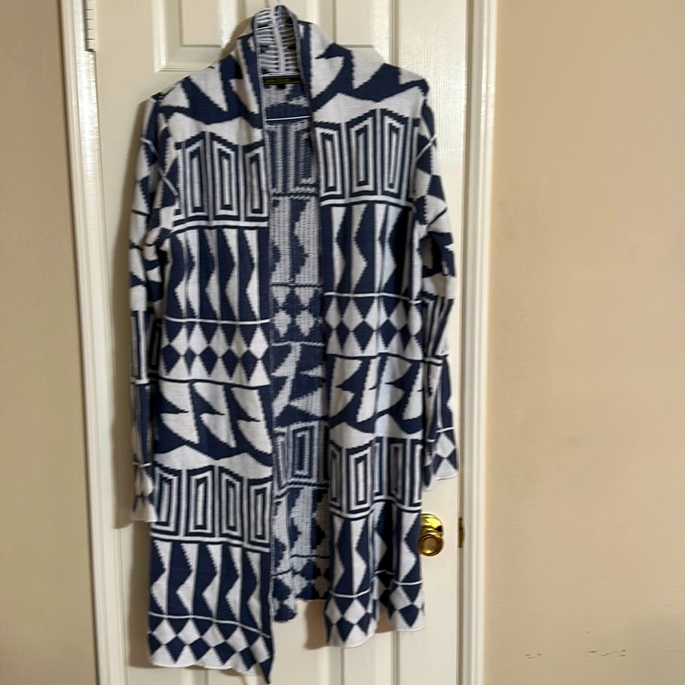 Light blue sweater multi shapes on sweater